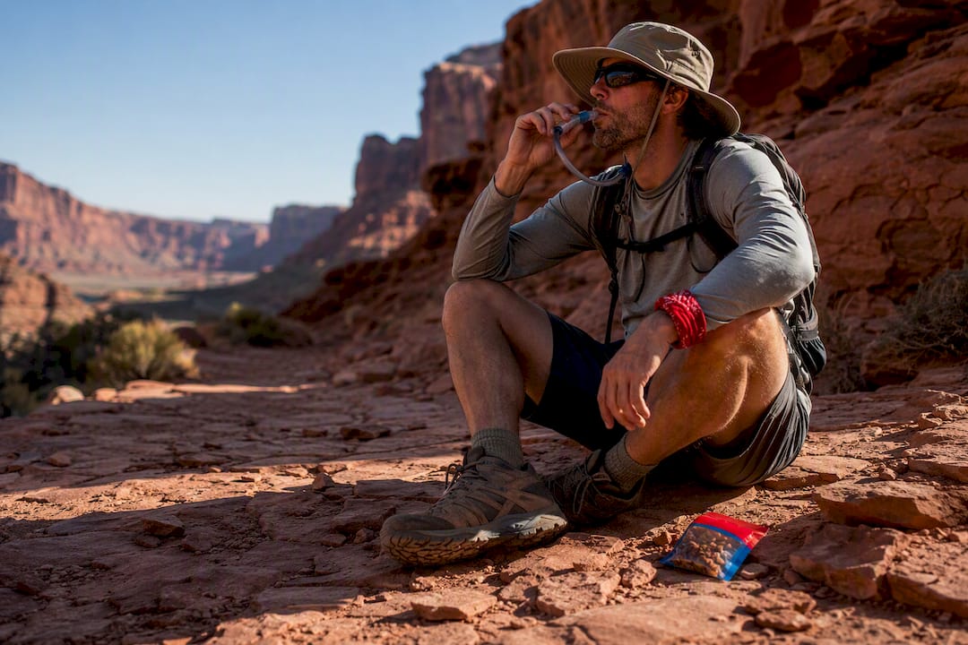 Desert hiker taking a hydration break